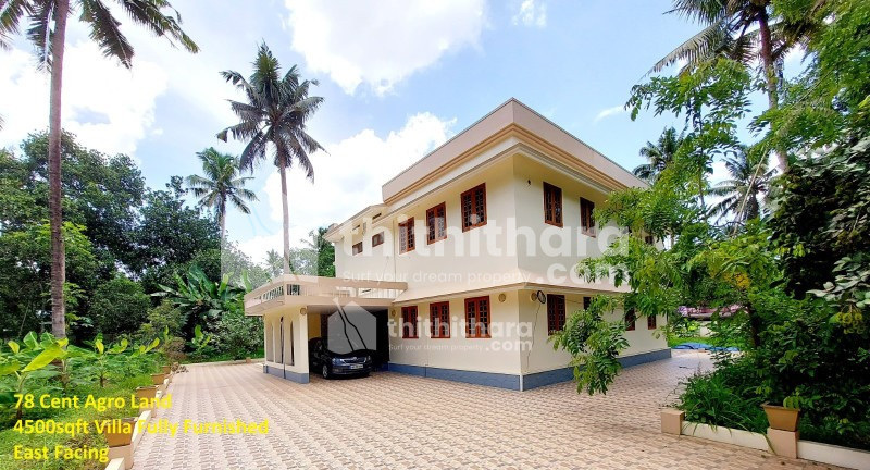 2 Storied house in 78 cents of agricultural land for sale at Karoor near Chalakkudy railway station.